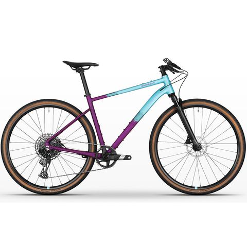 2026 Boardman TRVL 8.9 FB Alloy All Road Bike featuring a purple and blue frame with brown tires and disc brakes