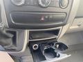 Interior console of a 2017 Mercedes-Benz Sprinter showing a cup holder and controls for air conditioning and audio settings