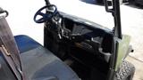 Interior view of a 2016 Polaris Ranger 570 Crew showcasing the steering wheel dashboard and seats