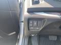 Dashboard controls of a 2017 Acura TLX featuring buttons for various functions including traction control and windshield wipers