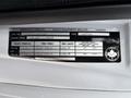 A label detailing specifications and identification information for a 2017 Ford Econoline including VIN tire size and weight ratings
