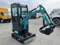 2024 AGT Industrial Green QH13R Mini Excavator with a compact design and hydraulic arm designed for digging and construction tasks