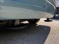 A 2000 Ford Motorhome with visible suspension supports underneath the vehicle
