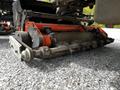 Close-up of a 2015 Jacobsen Eclipse lawn mower reel featuring sharp blades and brushes for cutting grass