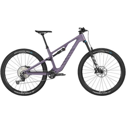A 2025 Canyon Neuron CF 7 mountain bike featuring a sleek purple frame wide tires and front suspension designed for off-road trail riding
