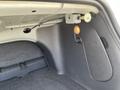 Interior of a 2005 Chrysler PT Cruiser showing the cargo area with a light and a black panel