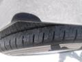 A close-up of a tire showing its tread pattern on a 2017 Ford Transit