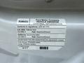 2023 Ford Transit with vehicle emission control information label attached