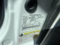 A 2013 Ford Expedition door sticker displaying manufacturing information and vehicle specifications