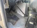 Interior view of a 2007 Morgan Olson Workhorse W42 showing the driver's footwell and metallic base with pedals and controls
