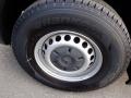Close-up of a 2016 Mercedes-Benz Sprinter wheel featuring a silver alloy rim with circular vent holes and a Hankook tire with a tread pattern