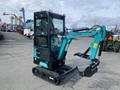 A 2024 AGT Industrial QH13R Mini Excavator with a black and teal exterior features a front bucket and a cab for operator comfort
