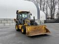 2011 John Deere 310SJ 4x4 Wheel Loader Extended Hoe 4 in 1 with a yellow and black body and a large front bucket ready for operation