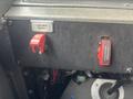 Control panel of a 2006 E-One Typhoon featuring red toggle switches labeled Load Mgr Disable and Emergency Shutdown