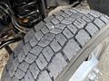 Close-up of a tire tread on a 2017 Ford F-550 showing deep grooves and a textured surface designed for traction and stability