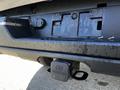 A close-up view of the rear hitch and bumper of a 2023 Toyota Tundra displaying the Toyota logo