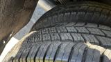 Close-up of a tire on a 2019 RAM 3500 showcasing tread patterns and surface details