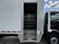 A 2018 Hino 195 truck with an open rear door revealing a set of metal stairs leading into the cargo area where shelves are visible