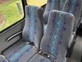 2020 Chevrolet Express with gray fabric seats featuring a blue and purple wavy pattern and seatbelts