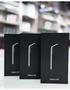 Three black boxes featuring the Samsung Galaxy S25 design and branding in a minimalist style