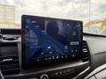 Interior dashboard of a 2022 Ford Transit showing a digital display with navigation and audio controls