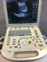 A Mindray M7 Ultrasound Machine featuring a large display screen showing an ultrasound image and a control panel with various buttons and a central trackball for navigation