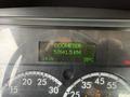 Dashboard display of a 2020 Freightliner M2 showing odometer reading of 57641.5 KM and additional metrics like voltage and temperature
