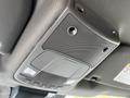 Interior overhead console of a 2020 Ford F-350 Super Duty featuring speaker grille and control buttons