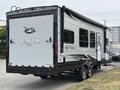 A 2021 Jayco Jay Flight travel trailer featuring a sleek exterior design with a prominent Jayco logo and multiple windows on the side