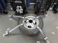 A 2020 Chevrolet Express wheel secured with straps in the center of the image