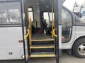 Interior view of a 2016 Chevrolet Express with a staircase leading to the driver's seat and passenger area