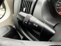 A close-up of a black multifunction control stalk for a 2018 RAM Promaster featuring switches for headlights, turn signals, and windshield wipers
