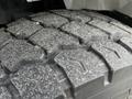 Close-up of the tread pattern on a tire from a 2008 International 7500 showing deep grooves and textured surface