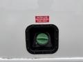 Green fuel cap on a 2011 Ford F-550 with a red sticker that reads ULTRA LOW SULFUR DIESEL FUEL ONLY