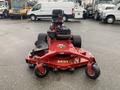 A 2017 Ferris Rotary lawn mower with a red frame two large rear wheels and a black seat positioned in the center