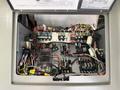 A close-up view of the fuse box inside a 2020 Chevrolet Express showing various fuses relays and wiring connections