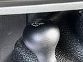 Close-up of the gear shift knob in a 2016 Ford F-550 showing the four-wheel drive mode selector