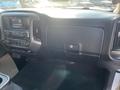 Interior of a 2015 Chevrolet Silverado 1500 showing the dashboard with controls and display system