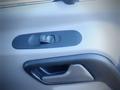 A door lock switch and handle in a 2017 Mercedes-Benz Sprinter interior