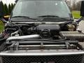 A 2005 GMC C5 Duramax engine with visible components including an air intake manifold and coolant reservoir