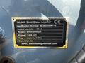 A metal identification plate for a 2024 SL 360 skid steer loader providing details on its specifications and capabilities