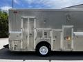 A 2008 Morgan Olson Workhorse delivery truck with a sleek silver metallic exterior featuring multiple access doors and a single white wheel on the side