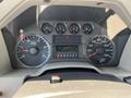 Dashboard of a 2008 Ford F-450 SD displaying speed, RPM, fuel level, and other gauges with digital readout showing mileage and other information