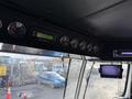Interior dashboard of a 2010 Autocar Xpeditor featuring gauges for speed fuel and engine temperature along with a digital display and a monitor
