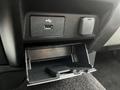 Interior view of a 2017 Ford F-150 featuring a USB port next to a small open storage compartment