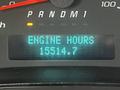 A digital display showing the engine hours of a 2019 Chevrolet Express reading 15514.7