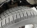 Close-up of a worn tire tread from a 2019 Chevrolet Express showing detailed patterns and grooves