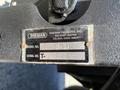 A metal identification plate from a Thieman Tailgates with model number S1 T1 and serial number T-159938