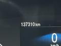 A digital display showing the odometer reading of a 2022 Ford Transit at 137310 km