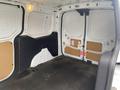 Interior view of a 2017 Ford Transit Connect cargo van showing bare walls and floor with no additional fittings or cargo present